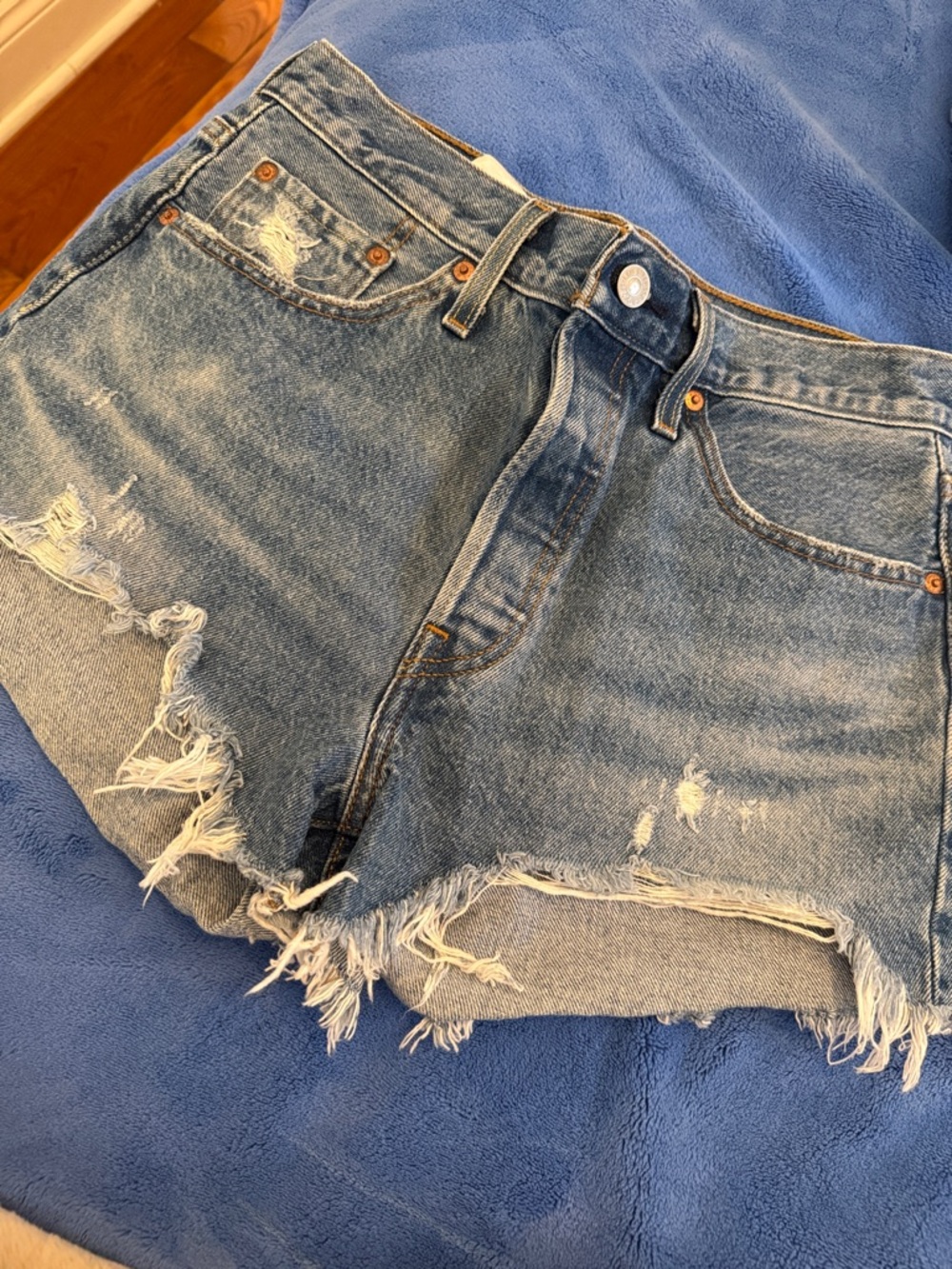 Levi's Distressed Light Blue Denim Cutoff Shorts